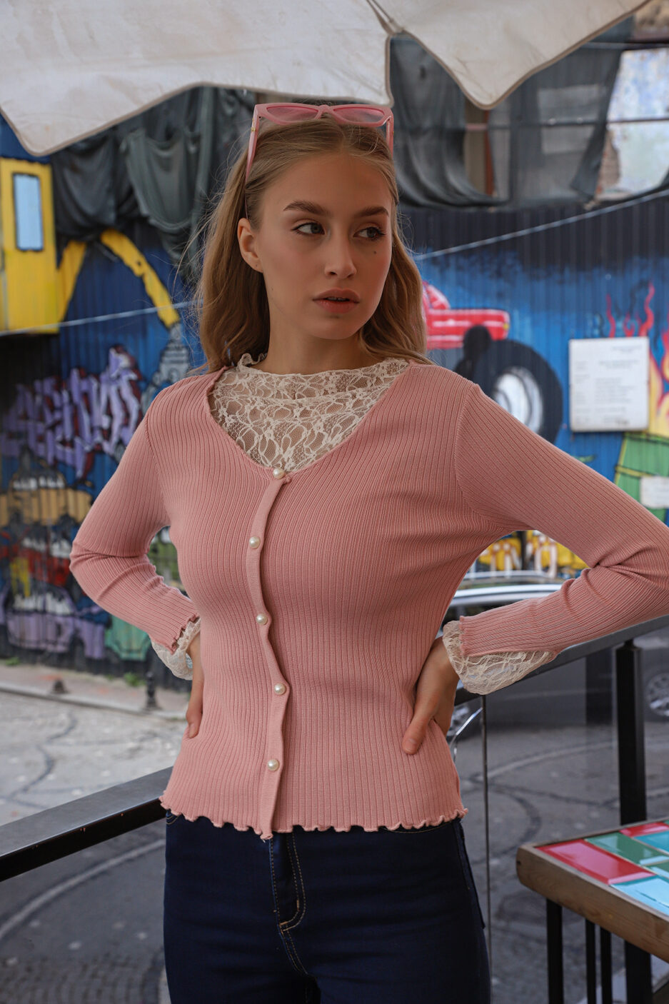 Pink striped knit sweater with button